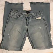 Celebrity pink distressed light wash denim lo rise flare jeans size 28
