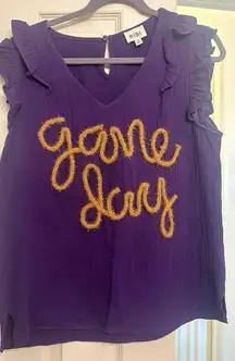 Game day tinsel writing top size medium worn twice dry cleaned LSU