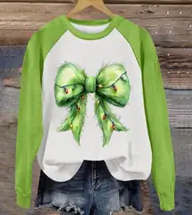 Grinch themed Bow Shirt Ladies size large Christmas sweater