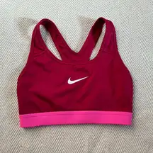 Nike burgundy and pink sports bra