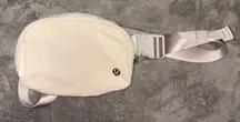 Lululemon White Opal / Silver Everywhere Belt Bag 1L Used Condition.  1 small stain shown in the photo 