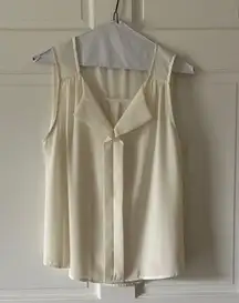 Chic Cream Sleeveless Blouse