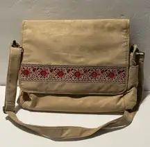 Boho Tan Suede Diaper Bag with Red Floral Design and a Red Folding Changing Pad