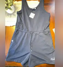 New size large woman’s navy blue Puma brand romper