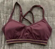 Women's size XS ‘So’ brand purple sports Bra