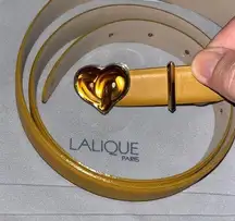 Beautiful Lalique belt 37” can be made smaller. Yellow python/cowhide strap.