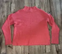 coral colored sweater