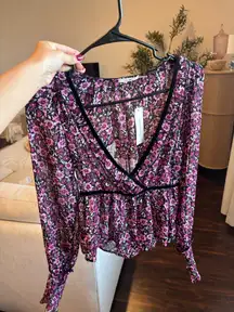 Francesca’s dark floral top 