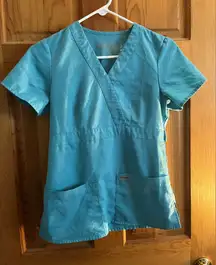 Greys anatomy professional wear scrub top in blue size xsmall
