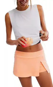 Free People Movement Hot Shot Mini Skort in Pastel Peach size L NWT