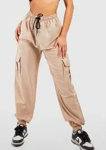 Boohoo windbreaker nude tan beige khaki baggy cargo pants drawstring joggers siz