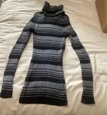 Black and gray striped woman’s size small ribbed fitted long sleeved turtleneck