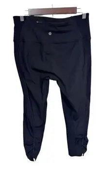 Lululemon Black Crop Leggings Ruched Hem Zip‎ Pocket High Rise Compression 10