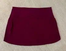 running skort cranberry color size medium