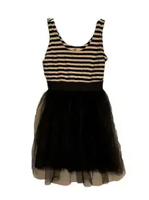 White and black dress with ballerina type skirt. Size large