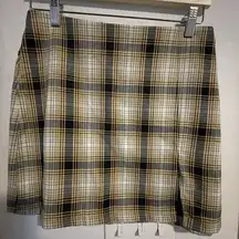 Urban Outfitters  size medium plaid yellow and black skirt. Clueless, tar…