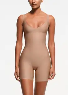 Skims body plunge mid thigh bodysuit in color sienna size small