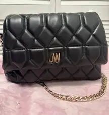Black shiny quilted Jason wu purse with gold chain