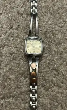 Rumors womens vintage silver stainless steel spinning heart charm watch one size