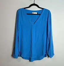 Veronica M. blue blouse