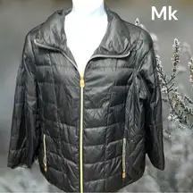 Michael Michael Kors lightweight black packable puffer jacket.