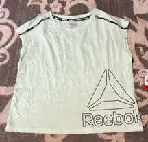 Reebok sleeveless t shirt. NWT. Size XS mint green. Work out wear.