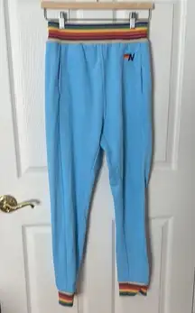 Aviator Nation blue joggers with Rainbow Accents small