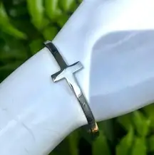 Stainless steel hinged cross bangle bracelet