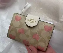 Coach Medium Corner Zip Wallet In Signature Canvas With Heart Print CQ146