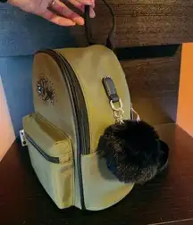 LD like dreams DRK GREEN MOSS-OLVE backpack black straps & fur ball out package