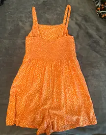 Orange patterned romper