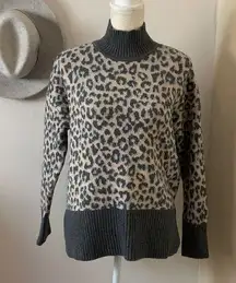 marled reunited clothing •leopard ribbed trim mock sweater