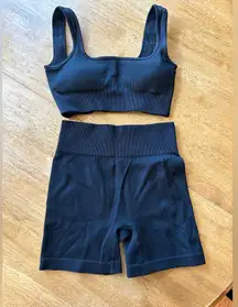 Women’s ribbed black workout shorts and sports bra set