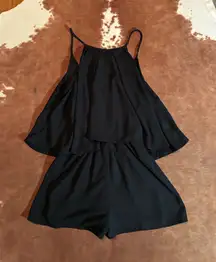 Pixi + Ivy Black Romper from a boutique  size medium 