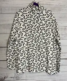 Chic Black and White Turtleneck Top With Bats