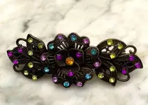 Hair clip with faux ruby and diamond decorative highlights