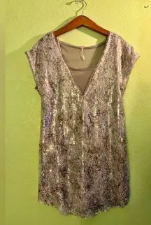 Free People  Sequin mini T-shirt style dress S NWOT has never been worn