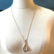 Dana Buchman silver tone infinity twist pendant necklace