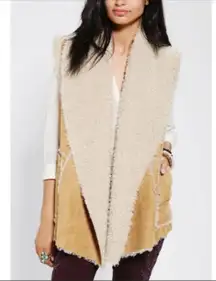 Hem & Thread size Medium/large faux sheepskin vest