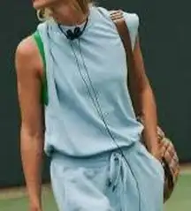 Free People Throw and Go Jumpsuit in baby blue . NWOT, size large.