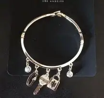 Guess bangle w charms crystals key