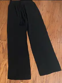 Bepop Black rayon high waste tie-up pants - Size Small. Beautiful rayon Black pull on pants. Elastic waste, with no pockets. Measurements approximately 13” not fully stretched out. Length 43” long x 10” rise. Non smoking home. priced to sell at as is condition. Don’t like my price, make reasonable offer! And thank you for checking my closet.