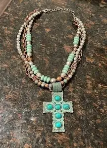 Costume jewelry Copper and turquoise colored cross and beaded necklace
