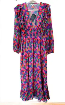 Area Stars maxi dress bright, bold, geometric print. Long sleeves, smock…