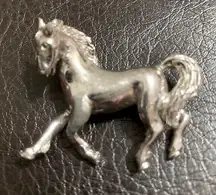 Vintage silver-tone horse brooch