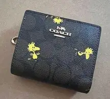 Coach  X Peanuts Snap Wallet In Signature Canvas With Woodstock Print C4592