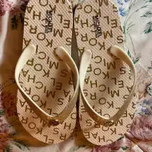 Michael Kors Gold and Cream Flip Flops