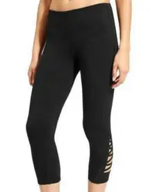 Athleta  Black Chaturanga Criss Cross Capri Leggings