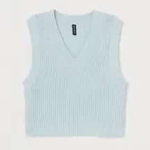 H&M Short sweater vest in a soft double knit. V-neck