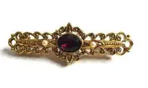 1928 Gold Tone Bar Brooch Purple Oval Rhinestone Seed Faux Pearl Filigree Pin